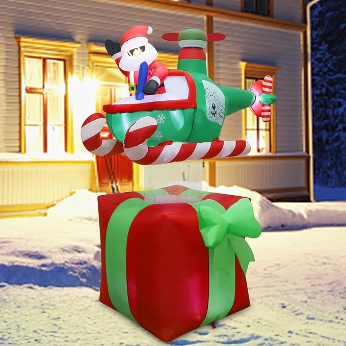 Juegoal Christmas Inflatables Outdoor Decorations, 6FT Inflatable Xmas Santa Claus with Helicopter on Gift Box, Lighted Blow Up Santa Flying Airplane, Built in Light for Holiday Lawn Yard Garden Decor