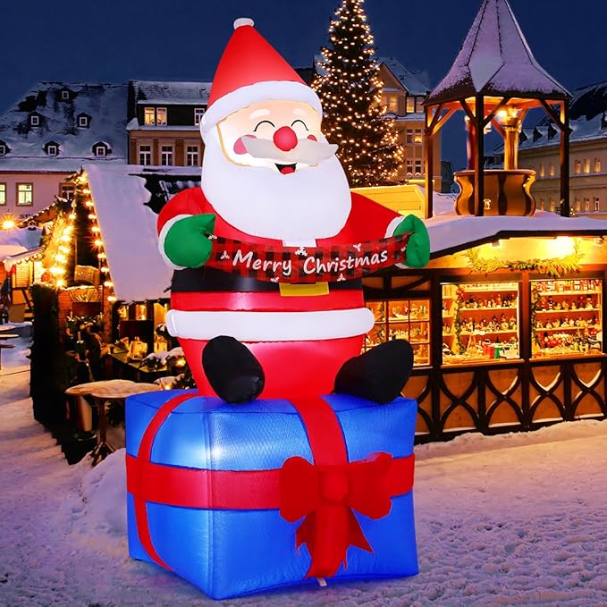 GOOSH 6 FT Christmas Santa Inflatables Outdoor Decorations Smiling Santa Claus Seated with Banner on Present Boxes Blow Up Yard with Built-in LEDs for Christmas Party Yard Garden Lawn Decoration