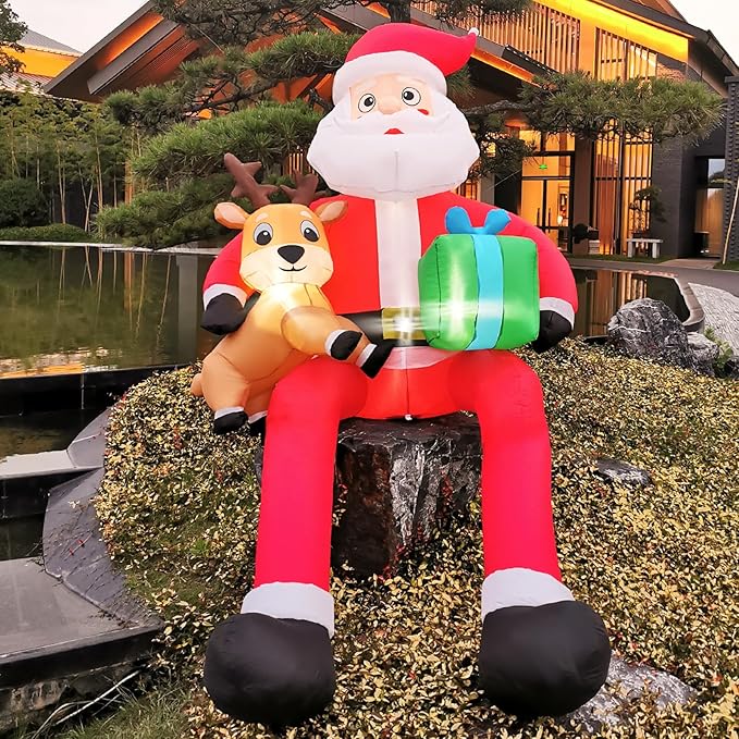 DearSun 10FT H Christmas Inflatable Sitting Santa Claus with Build-in LED Lights, Blow up Santa Claus with Gift Bag and Deer Sitting on Roof Wall Tree Chair Indoor Outdoor Decor