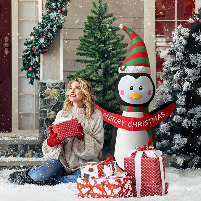 HONGLAND 4 FT Christmas Inflatables Giant Penguin Outdoor Decorations, Built-in Bright LED Light with Merry Christmas Sign, Weatherproof Holiday for Garden Lawn Patio Party Xmas Gifts